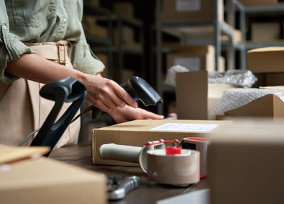 Woman scanning an order for shipment