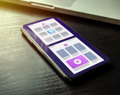 smart phone on a desk displaying an a/b test