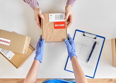 return package getting handed to worker