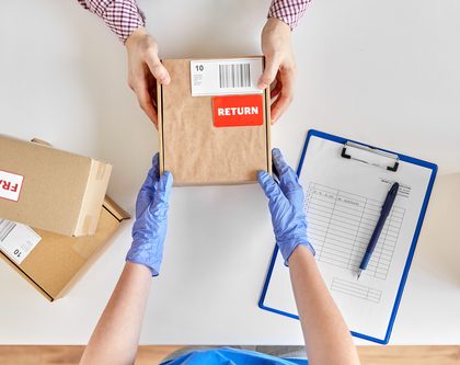 return package getting handed to worker