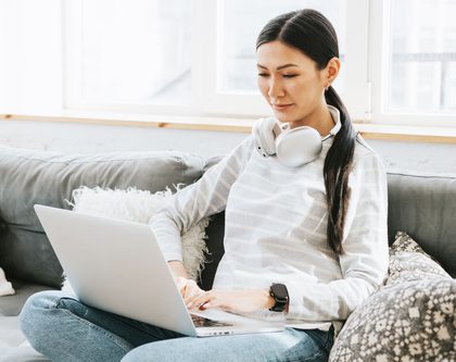 A woman working on a laptop