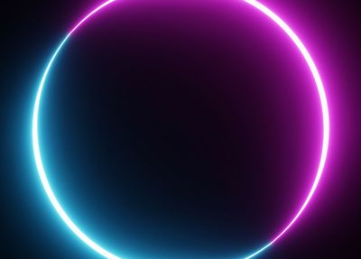 A glowing neon circle stands out against a black backdrop and represents the Amazon halo effect