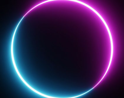A glowing neon circle stands out against a black backdrop and represents the Amazon halo effect