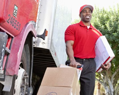 delivery man carrying packages
