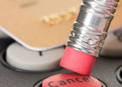 pencil pressing on the cancel button