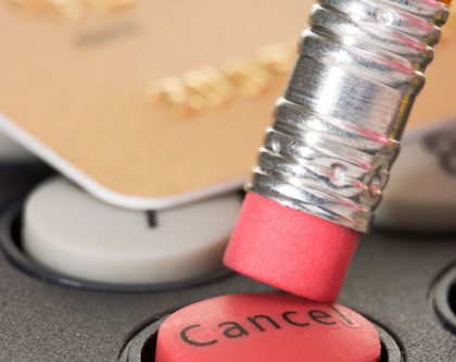 pencil pressing on the cancel button