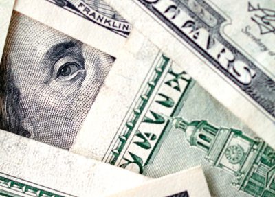 a detailed close-up of a stack of money