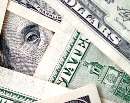 a detailed close-up of a stack of money