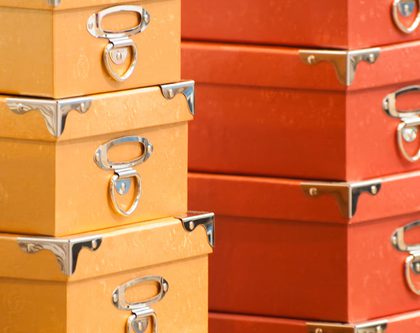 two rows of yellow and red stacked boxes reaching capacity limits