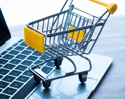 A shopping cart on a laptop