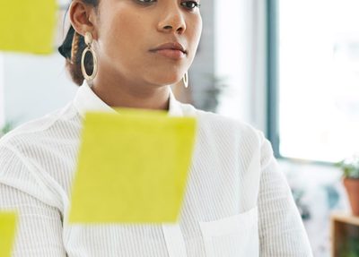 a woman analyzing tacos and acos