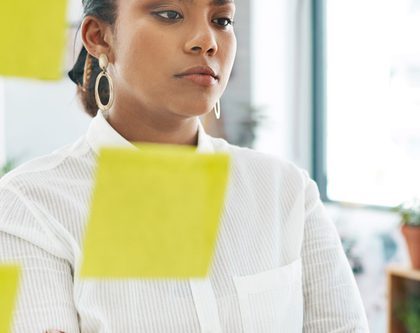 a woman analyzing tacos and acos