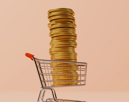 a shopping cart with coins inside