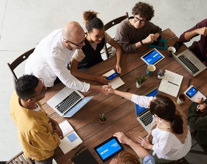 people working together on a facebook advertising strategy