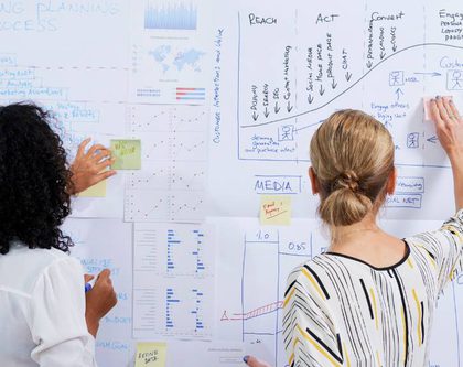 two-women-working-on-strategy
