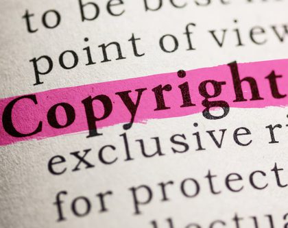 Copyright highlighted in pink on paper