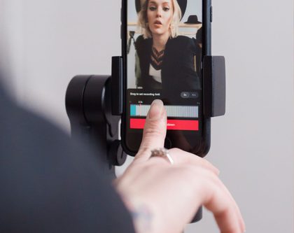 woman-recording-on-cell-phone