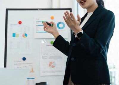 business woman presenting in a modern office