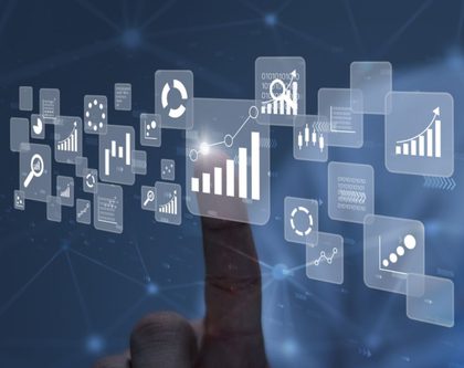 hand pointing to a graph within a dashboard surrounded by various data icons