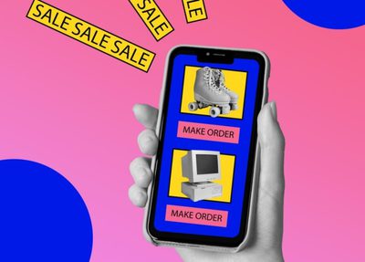 hand holds up a phone displaying an online shopping site