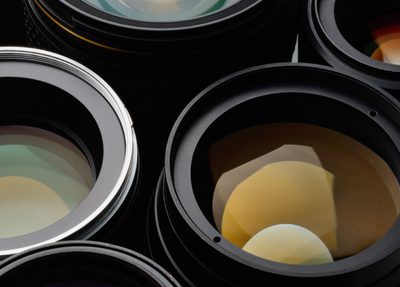 a collection of various camera lenses arranged together