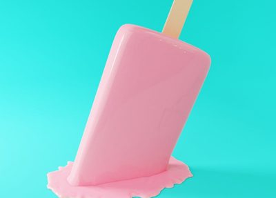 a melting popsicle against a bright blue background